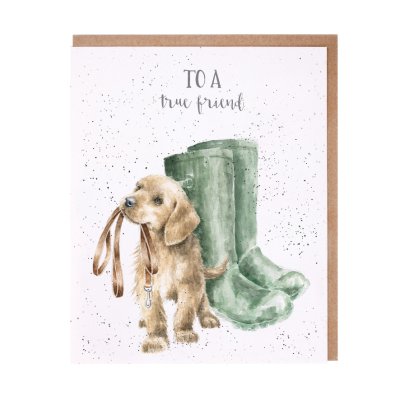 Labrador with a lead in its mouth next to green wellies friendship card